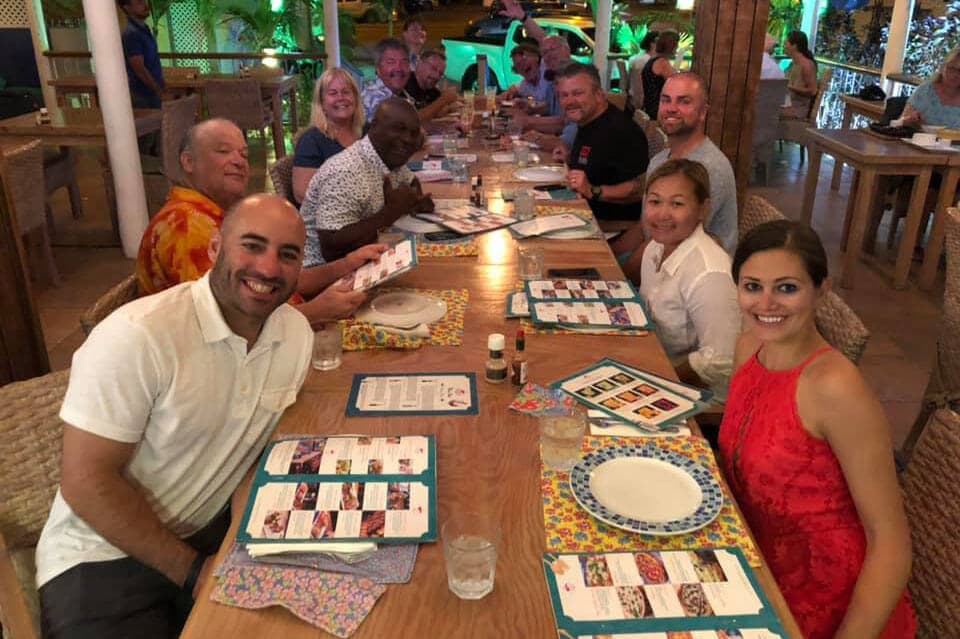 Travelers enjoying a tropical destination with SXT Adventures
